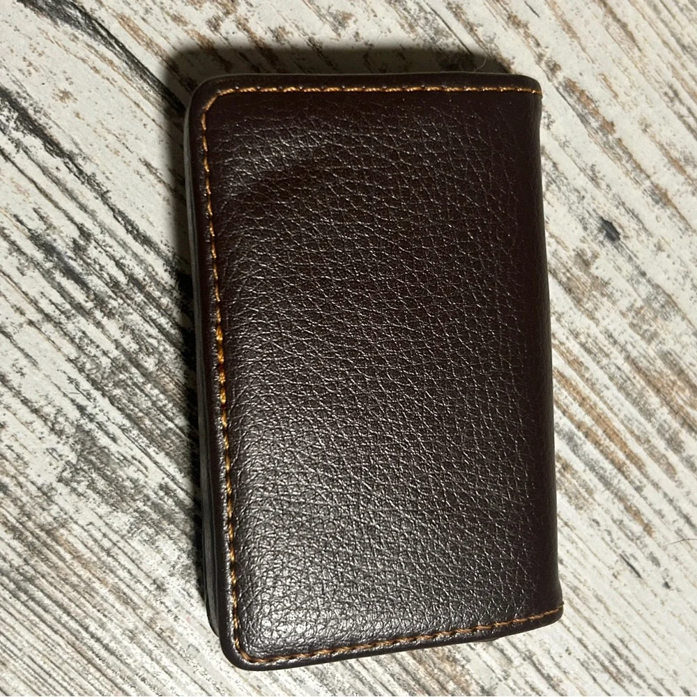 Brown Ocadux Leather Business Card Holder is a compact, pocket-sized wallet